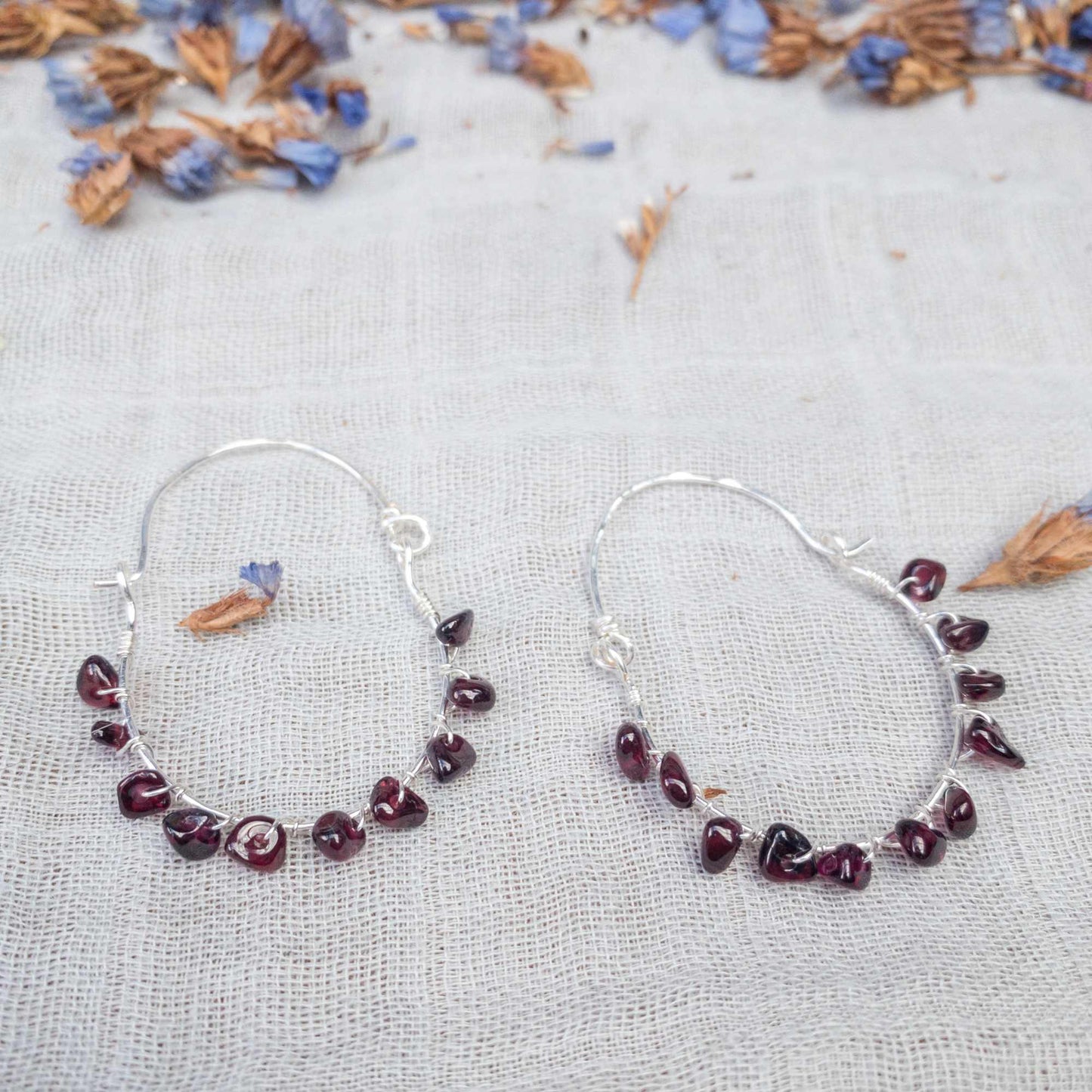 handwoven red garnet hoop earrings in silver filled wire