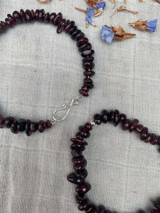 Red garnet bracelet one stretch cord one memory wire with silver handmade clasp close up