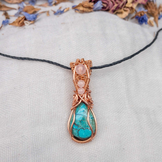 chrysocolla and rose quartz wire wrapped in copper pendant on an adjustable hemp cord necklace
