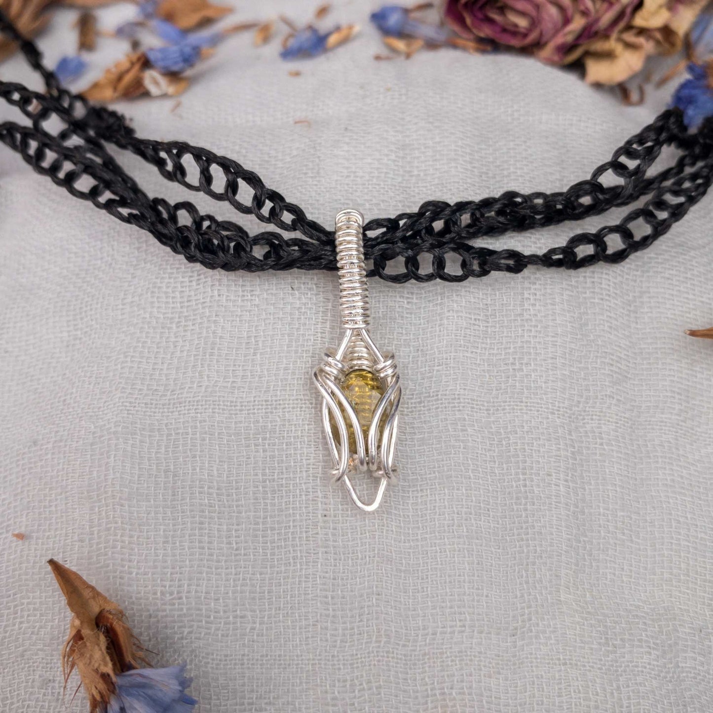 green tourmaline and silver filled wire dainty wire wrapped pendant displayed on vegan silk chain option