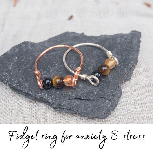 two triple fidget ring grounding and success black agate tigers eye carnelian