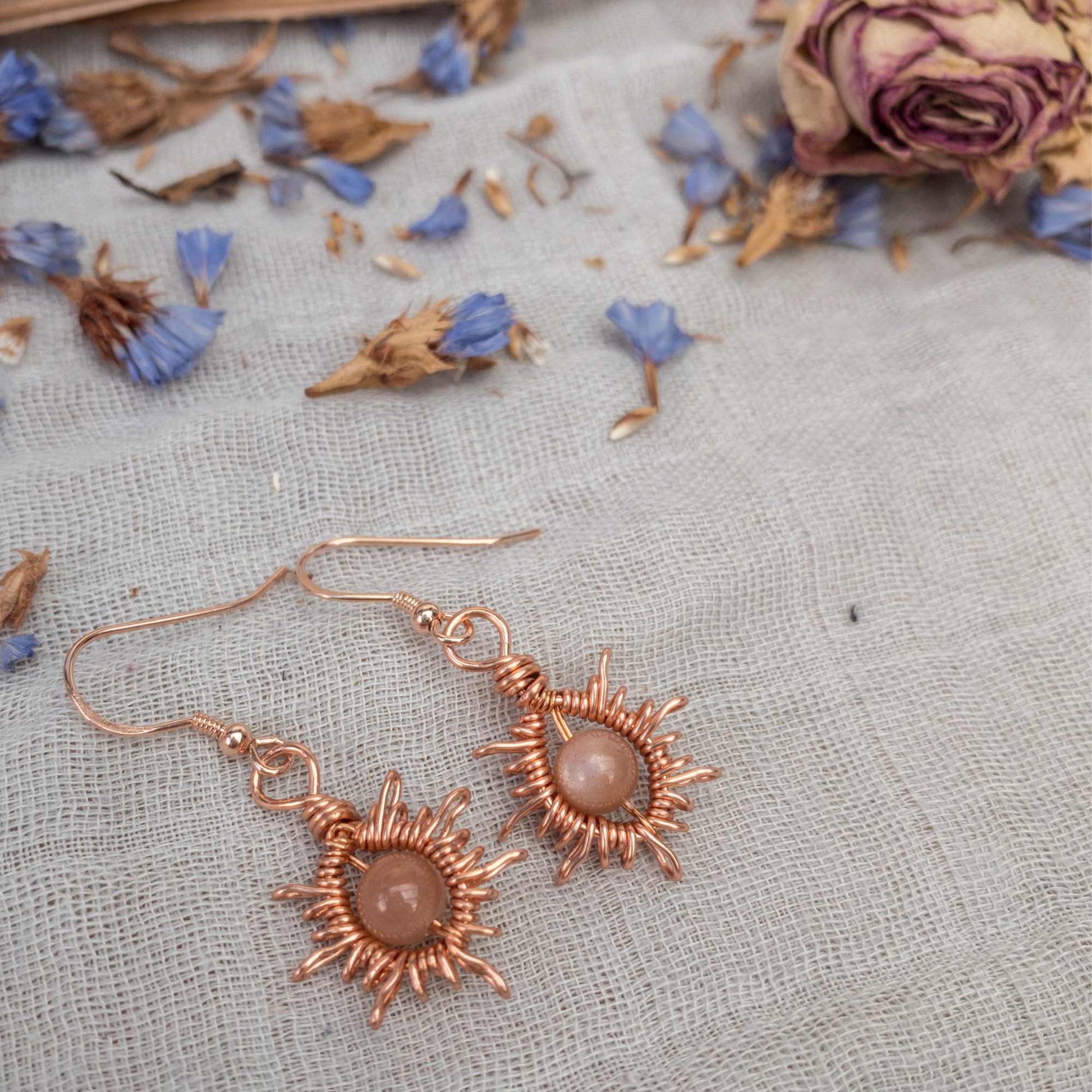sunburst wire woven wrapped earrings with sunstone beads 