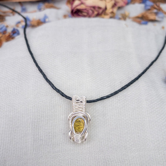 light green tourmaline wire wrapped in silver filled wire delicate art deco style with hand tied adjustable hemp cord